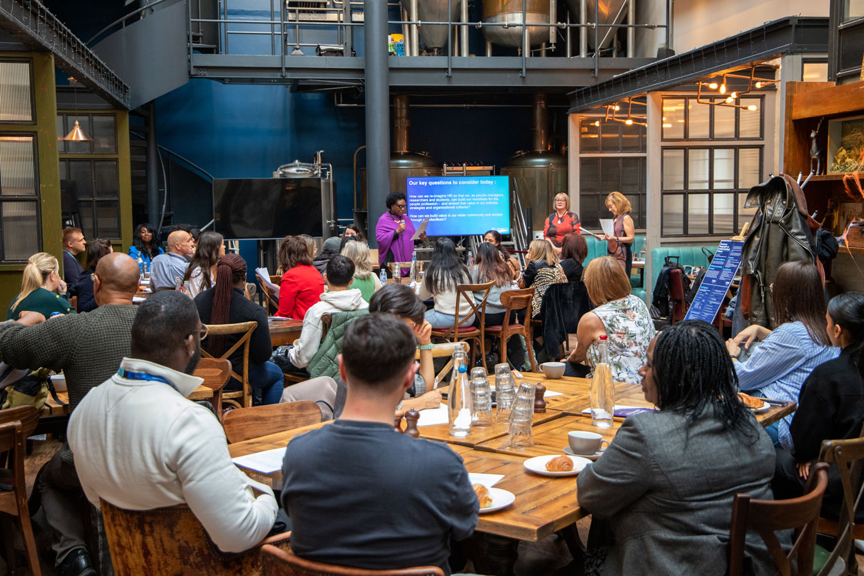 People looking and listening during unconference 2024